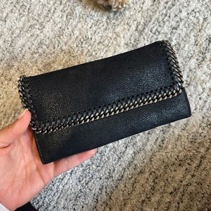 Stella McCartney's Falabella Flap wallet in black